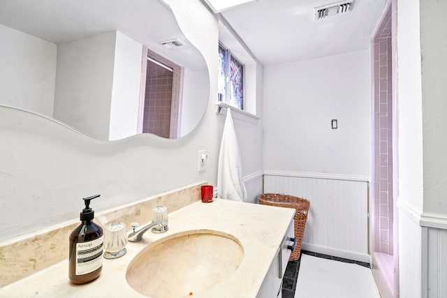 bathroom featuring vanity and tile patterned flooring