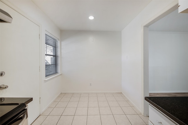 interior space featuring light tile patterned floors