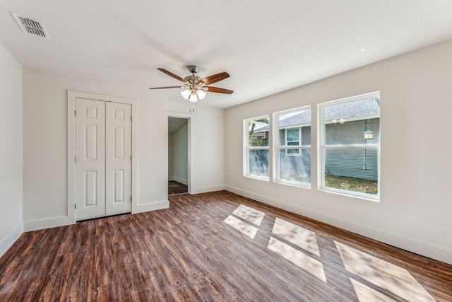 1046 W Green St, Stephenville, TX 76401 - unfurnished bedroom featuring baseboards, wood finished floors, and a closet