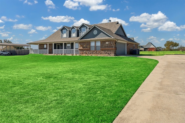 view of front of home with a porch and a front lawn