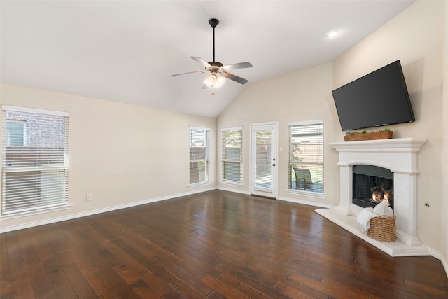 unfurnished living room with vaulted ceiling, ceiling fan, and dark hardwood / wood-style flooring