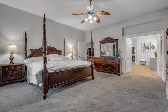 bedroom featuring ceiling fan and light colored carpet