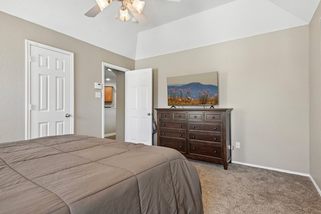 carpeted bedroom featuring ceiling fan and lofted ceiling