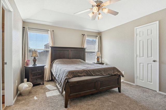 bedroom with multiple windows, carpet floors, and ceiling fan