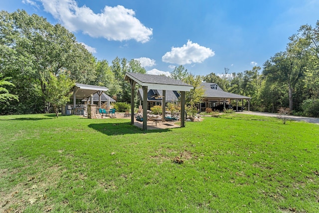 view of yard with a gazebo and a patio area