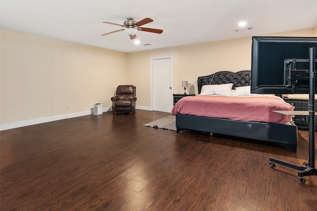 bedroom featuring ceiling fan and dark hardwood / wood-style flooring