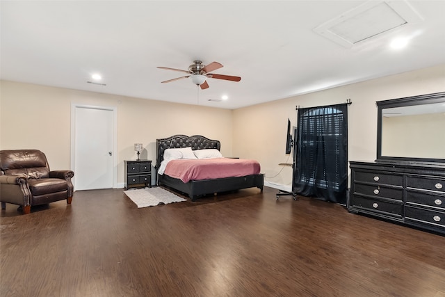 bedroom featuring dark hardwood / wood-style flooring and ceiling fan