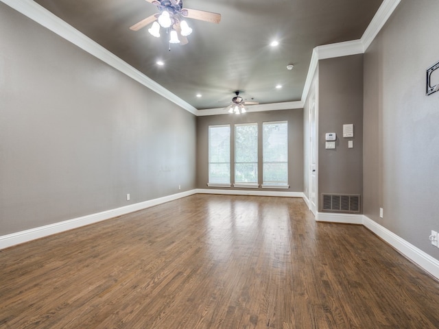 unfurnished room with crown molding, dark wood-type flooring, and ceiling fan