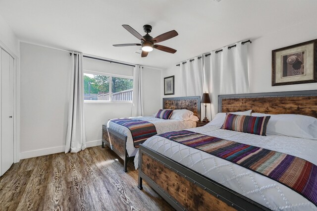 bedroom featuring a closet, hardwood / wood-style flooring, and ceiling fan