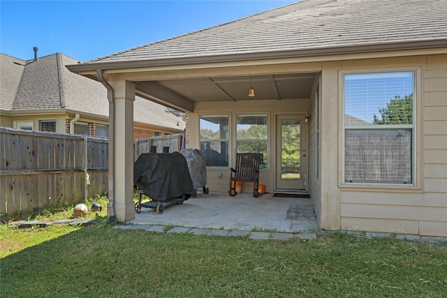 exterior space featuring a patio and a lawn