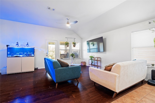 living room featuring ceiling fan, vaulted ceiling, and hardwood / wood-style floors