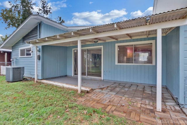 back of house with a patio, a pergola, a yard, and central AC unit