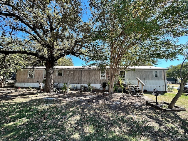 exterior space with a front lawn