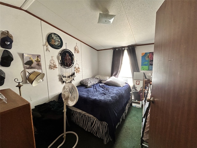 carpeted bedroom featuring crown molding and a textured ceiling