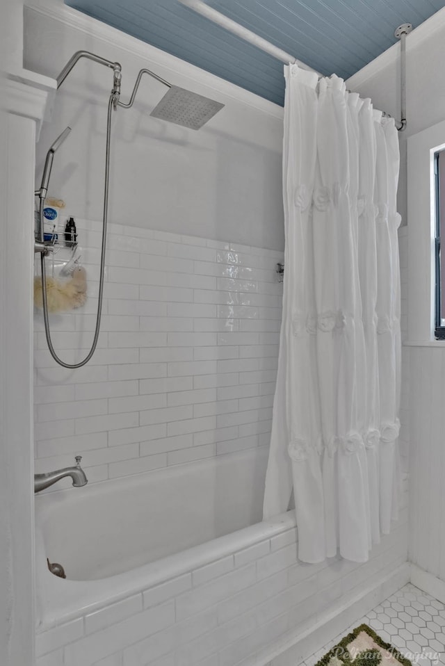 bathroom featuring shower / bath combination with curtain and tile patterned floors