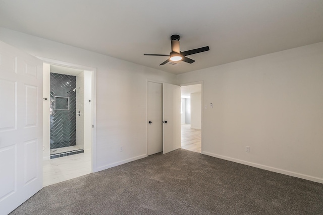 carpeted empty room with ceiling fan