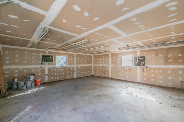 garage featuring an AC wall unit