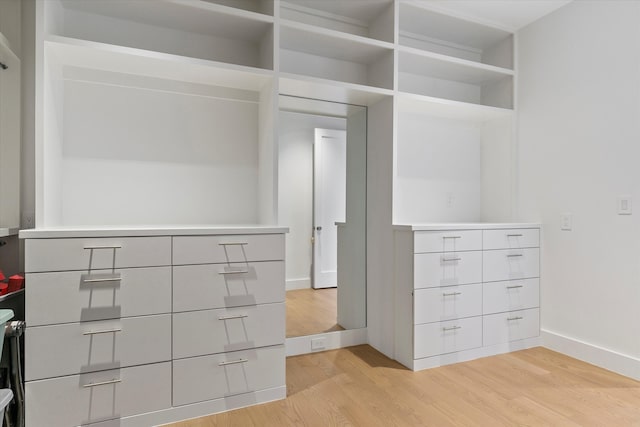 walk in closet featuring light wood-type flooring