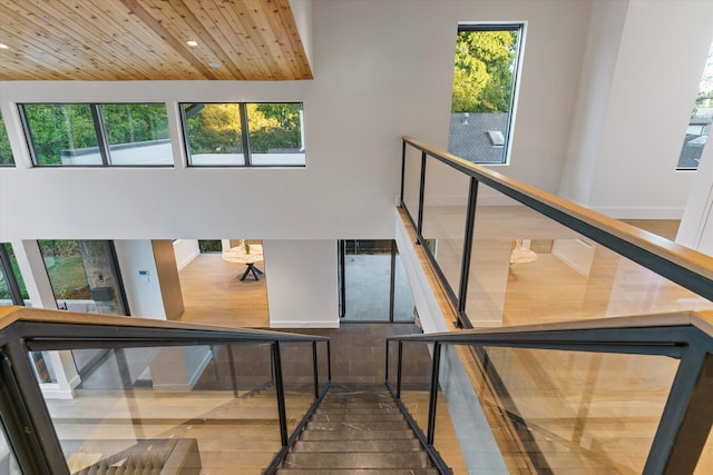 staircase featuring wood ceiling