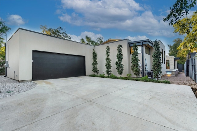 modern home featuring a garage