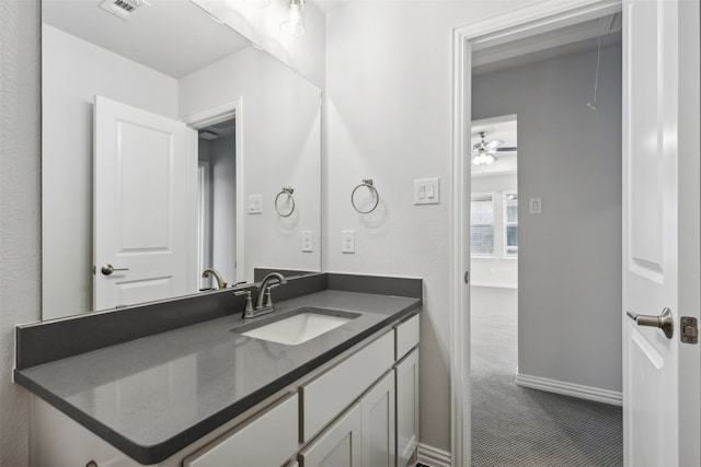 bathroom featuring vanity and ceiling fan