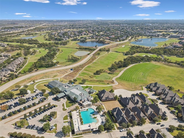 birds eye view of property featuring a water view, a residential view, and golf course view