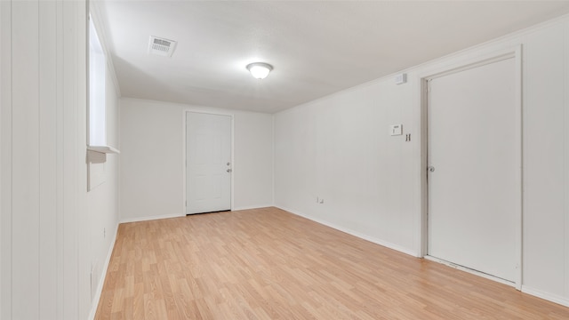 unfurnished room featuring light wood-type flooring