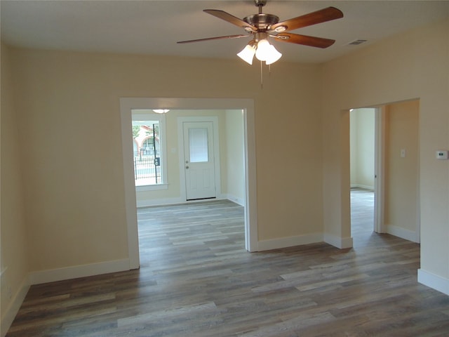 unfurnished room with ceiling fan and light hardwood / wood-style flooring