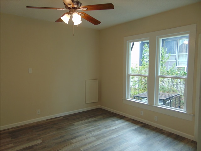 empty room featuring hardwood / wood-style floors, plenty of natural light, and ceiling fan