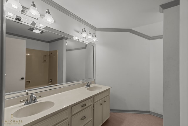 bathroom with vanity and ornamental molding