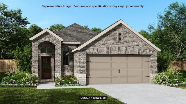 view of front facade with a garage and a front lawn