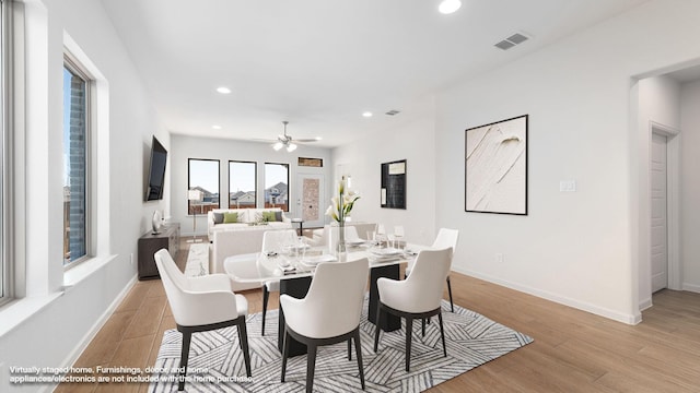 dining room featuring light wood-type flooring