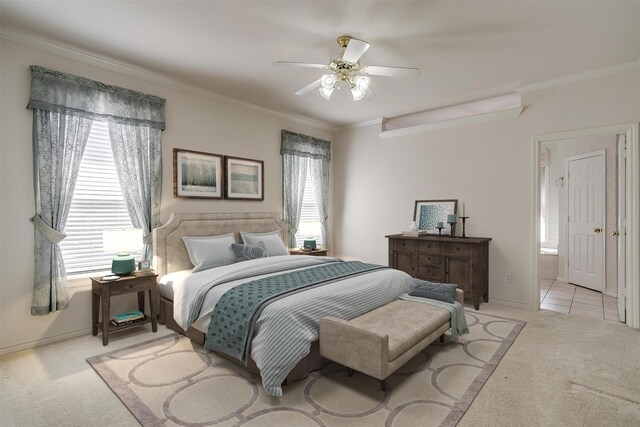 empty room featuring crown molding, light tile patterned floors, and ceiling fan