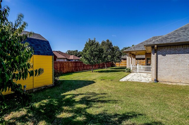 view of outdoor structure with a lawn