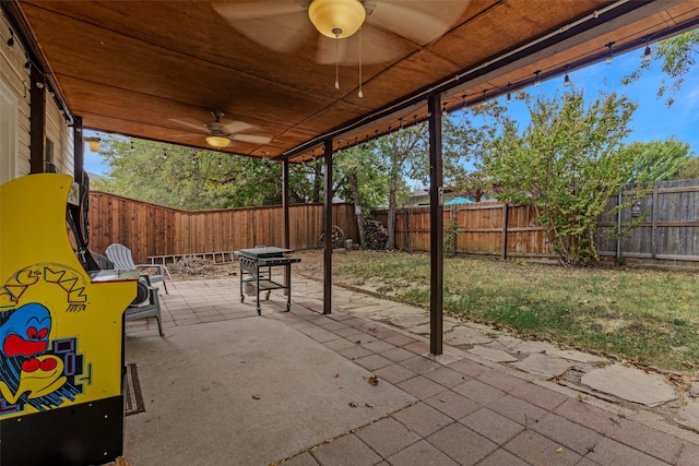 view of patio featuring ceiling fan