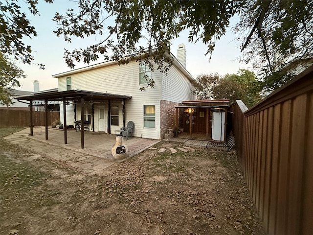 rear view of house with a patio area