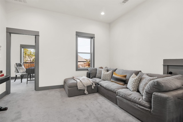 living room featuring light colored carpet