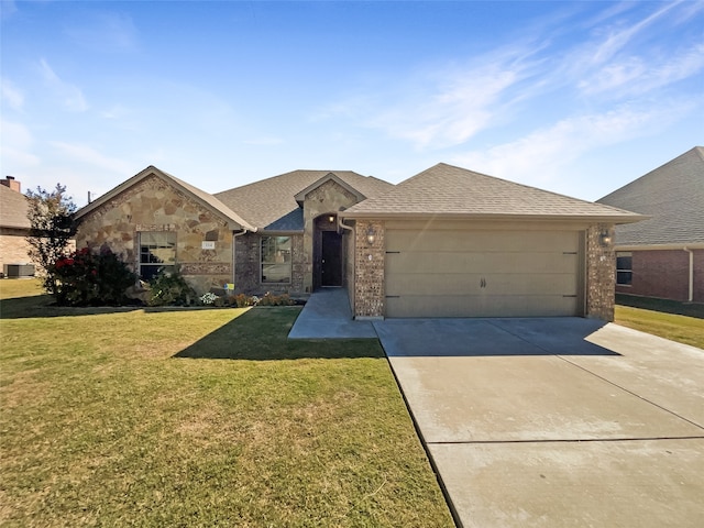 view of front of home featuring a front yard and central AC unit