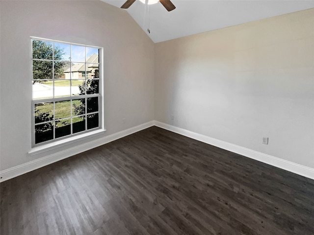 empty room featuring ceiling fan, lofted ceiling, and dark hardwood / wood-style flooring