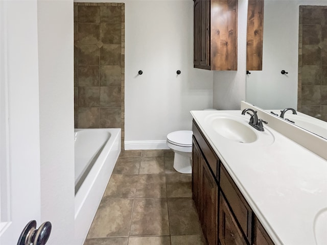 bathroom featuring vanity, toilet, and tile patterned floors