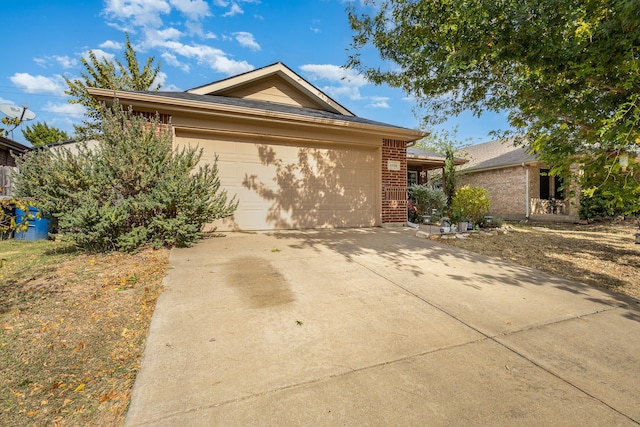 view of side of property with a garage