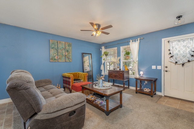 living room with carpet and ceiling fan