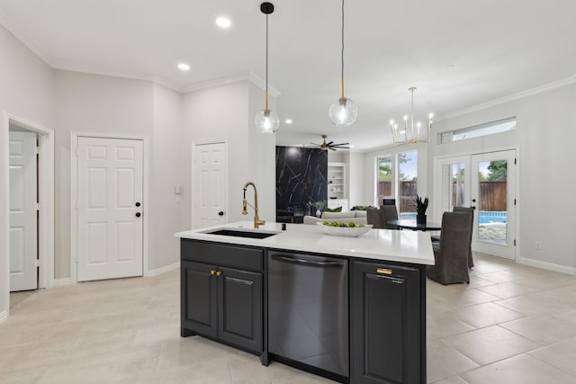 kitchen featuring an island with sink, stainless steel dishwasher, ornamental molding, ceiling fan with notable chandelier, and sink