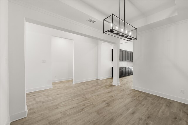 unfurnished living room with light hardwood / wood-style floors