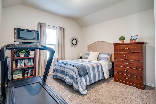 carpeted bedroom featuring a crib