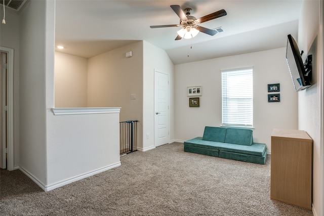 bathroom featuring tile patterned flooring, curtained shower, vanity, lofted ceiling, and toilet