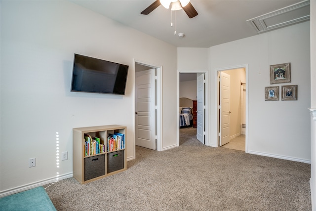 unfurnished room with carpet, vaulted ceiling, and ceiling fan