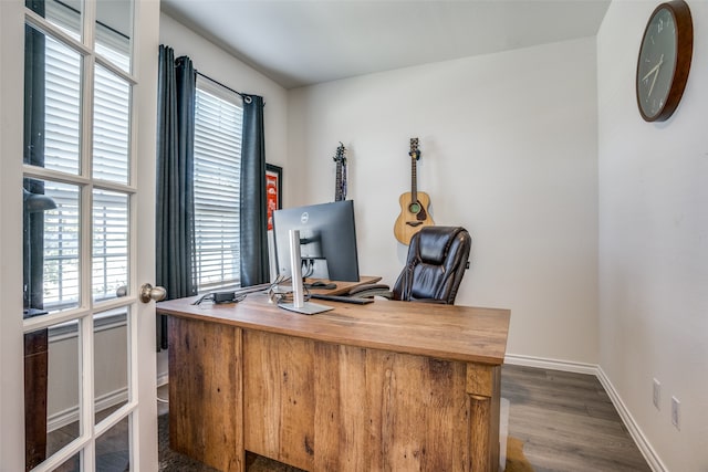 dining room with hardwood / wood-style floors