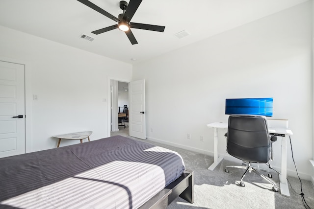 bedroom with light carpet and ceiling fan