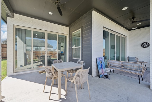 view of patio / terrace featuring ceiling fan